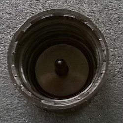 Screw cap PP ø 18, black color, with peg for brush